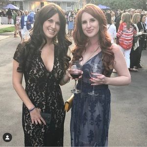 Black formal gown size 2 has some stretch too it. Perfect condition